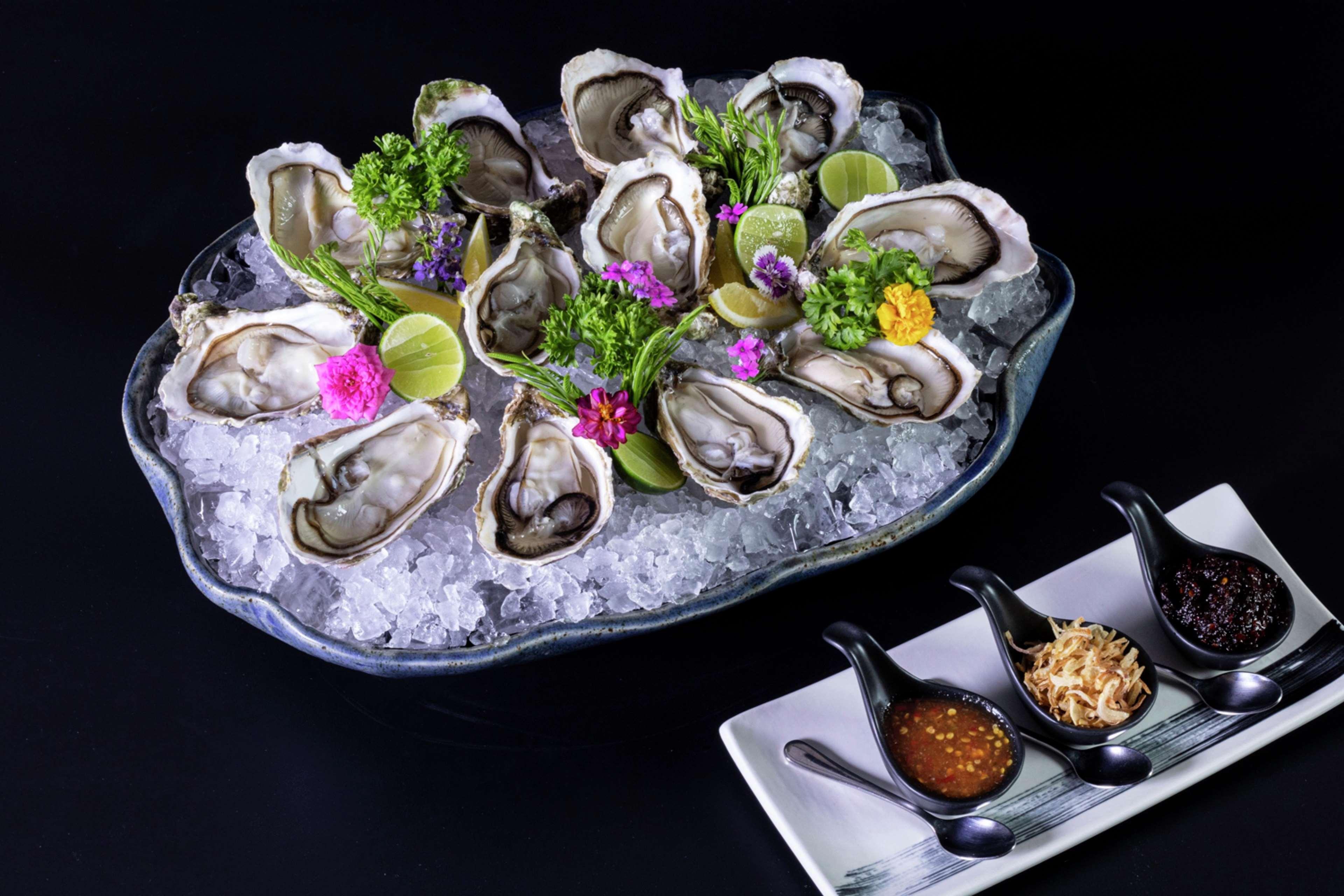 Отель Hilton Паттайя Экстерьер фото Oysters on ice