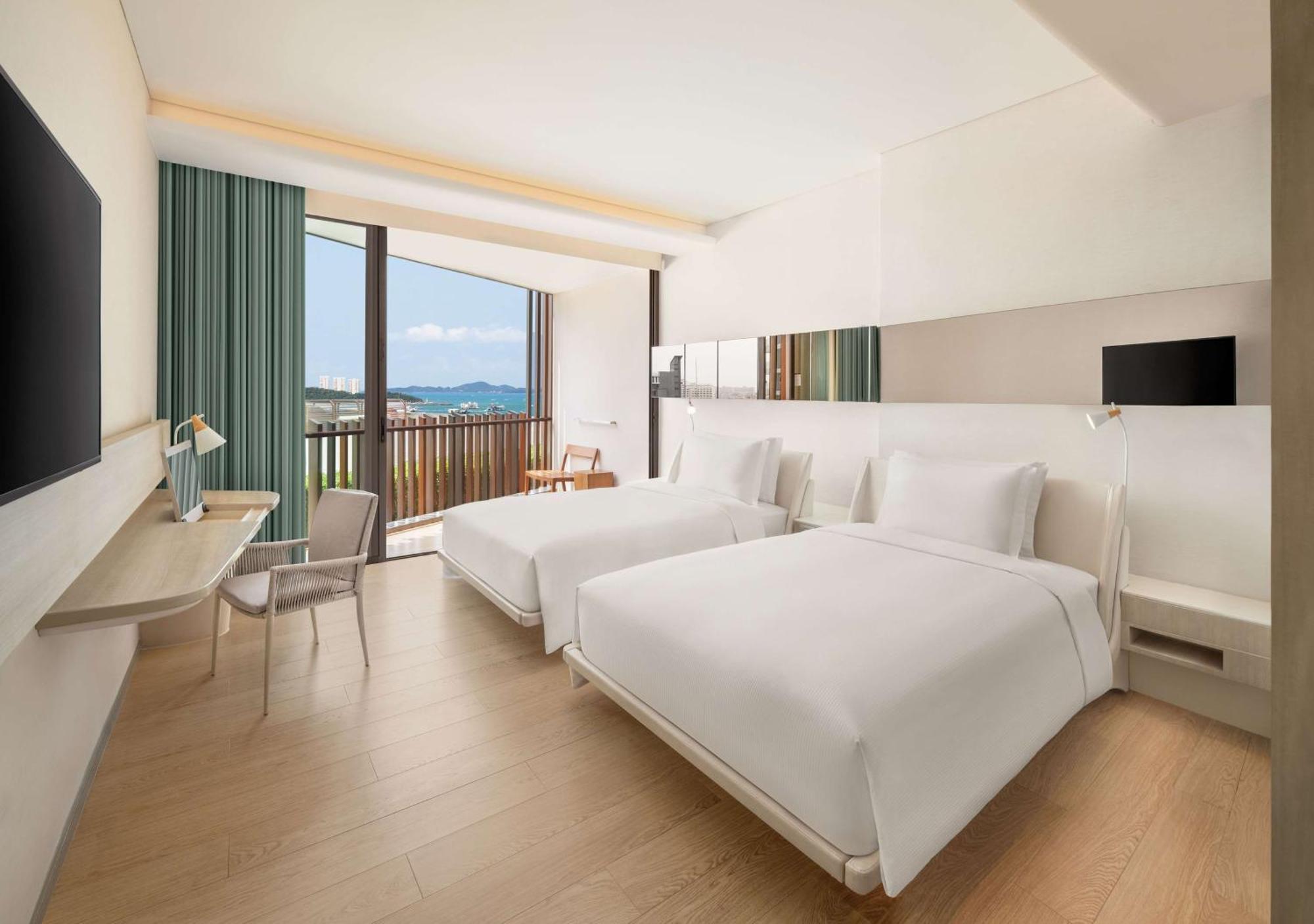 Отель Hilton Паттайя Экстерьер фото Deluxe Ocean View